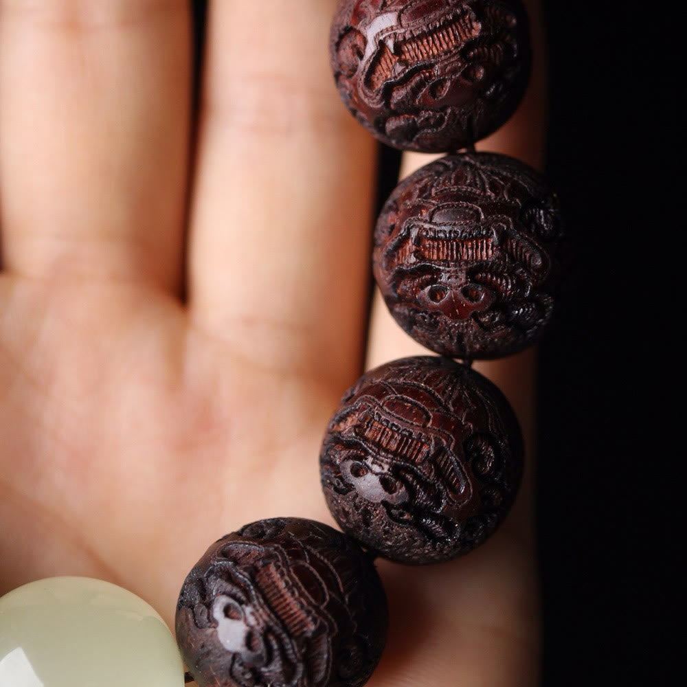 Braccialetto PiXiu Warmth con incisione in palissandro tibetano Buddha Stones