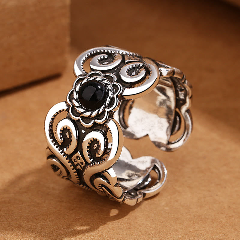 Anello regolabile della fortuna con motivo mongolo in onice nero e rame di Buddha Stones
