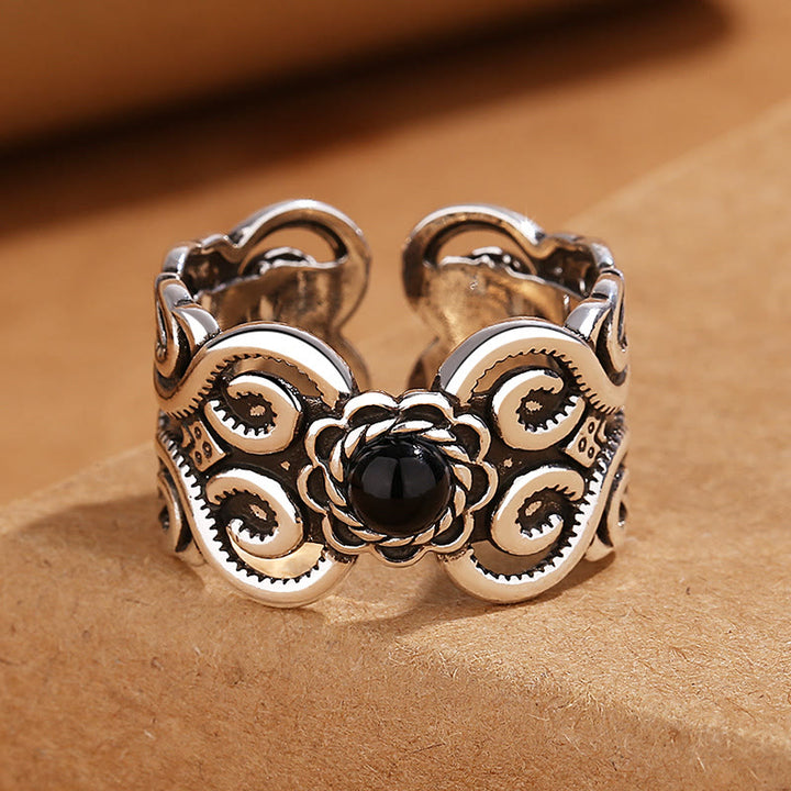 Anello regolabile della fortuna con motivo mongolo in onice nero e rame di Buddha Stones