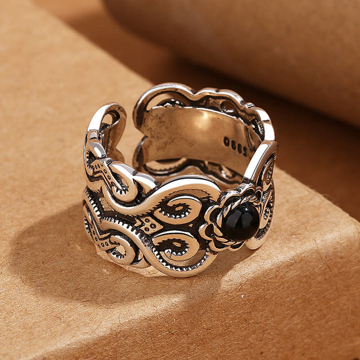 Anello regolabile della fortuna con motivo mongolo in onice nero e rame di Buddha Stones