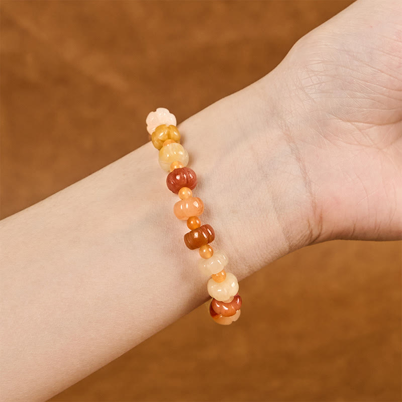 Braccialetto di fortuna e ricchezza con perle di zucca in giada di seta dorata e Buddha Stones