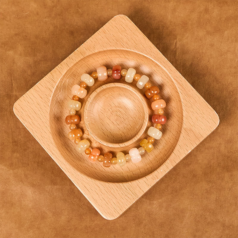 Braccialetto di fortuna e ricchezza con perle di zucca in giada di seta dorata e Buddha Stones