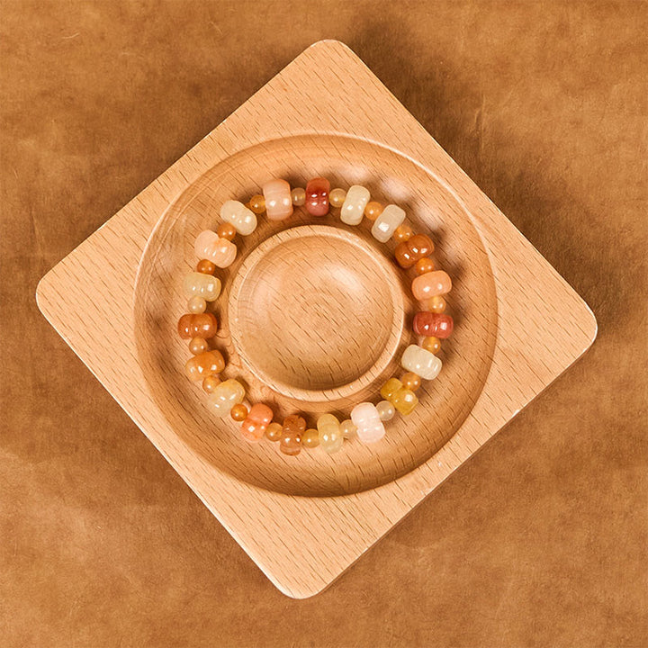 Braccialetto di fortuna e ricchezza con perle di zucca in giada di seta dorata e Buddha Stones