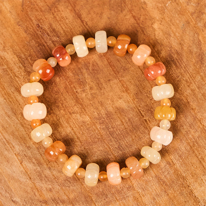 Braccialetto di fortuna e ricchezza con perle di zucca in giada di seta dorata e Buddha Stones