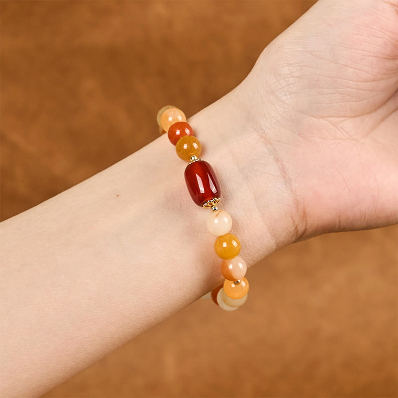 Braccialetto di fortuna e ricchezza di zucca con perle di giada di seta dorata e Buddha Stones