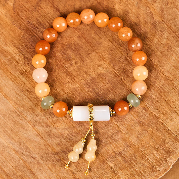 Braccialetto per la fortuna e la ricchezza in cristallo bianco, perline di giada di seta dorata e Buddha Stones