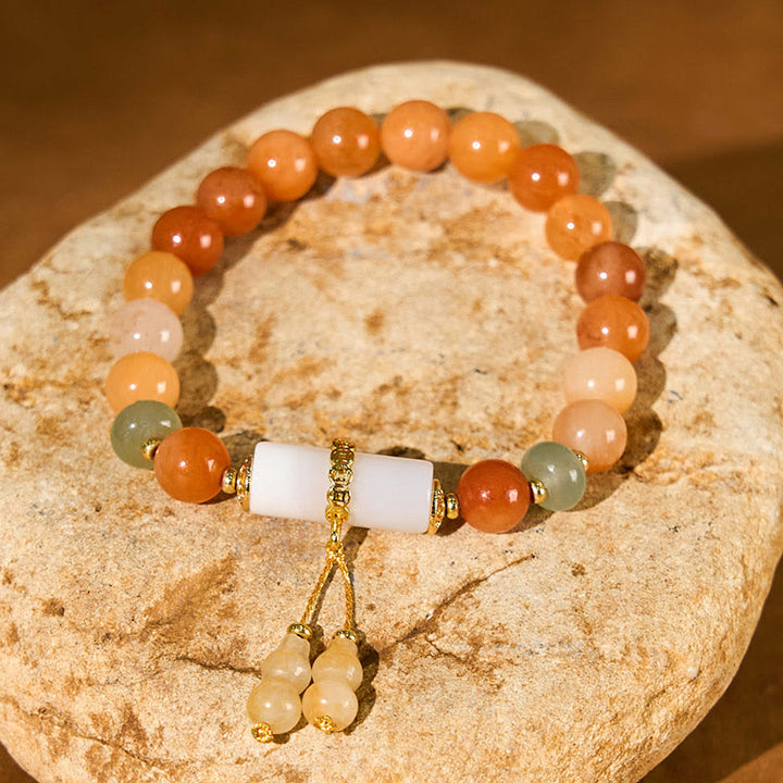 Braccialetto per la fortuna e la ricchezza in cristallo bianco, perline di giada di seta dorata e Buddha Stones
