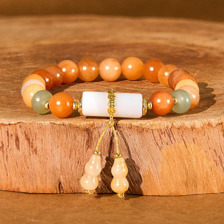 Braccialetto per la fortuna e la ricchezza in cristallo bianco, perline di giada di seta dorata e Buddha Stones