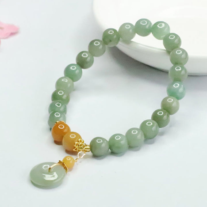 Bracciale Buddha Stones, perle di giada, fibbia della pace, prosperità e abbondanza