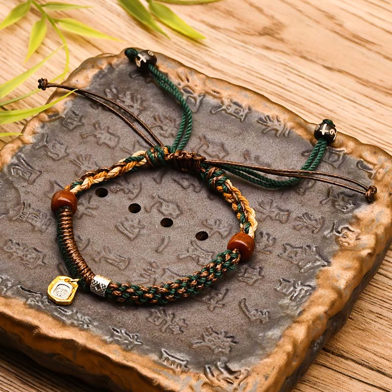 Bracciale intrecciato in legno di protezione Buddha Stones , fatto a mano in stile tibetano Zakiram, dea della ricchezza
