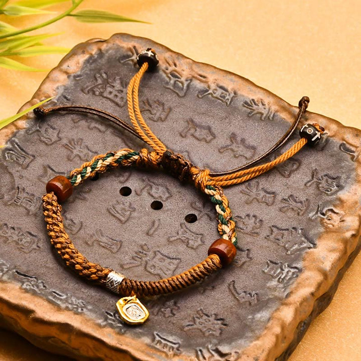 Bracciale intrecciato in legno di protezione Buddha Stones , fatto a mano in stile tibetano Zakiram, dea della ricchezza