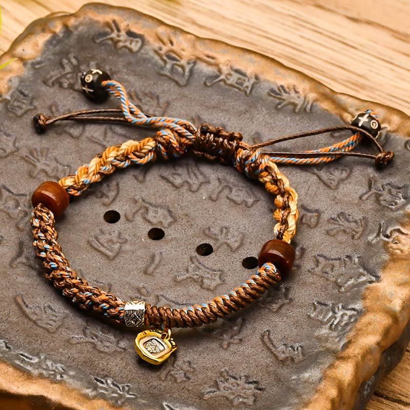 Bracciale intrecciato in legno di protezione Buddha Stones , fatto a mano in stile tibetano Zakiram, dea della ricchezza