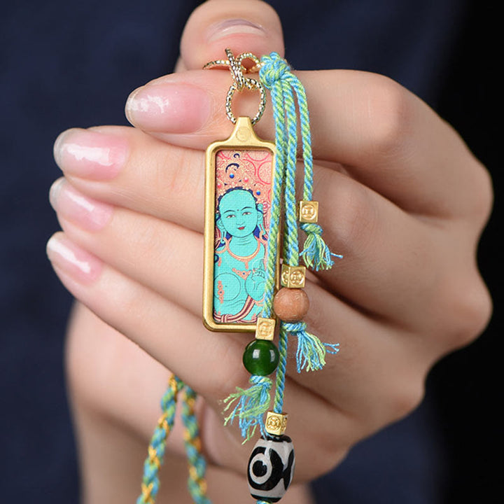 Collana con ciondolo "Thangka della ricchezza" in acciaio al titanio, simbolo del dio della ricchezza Buddha Stones in Tibet