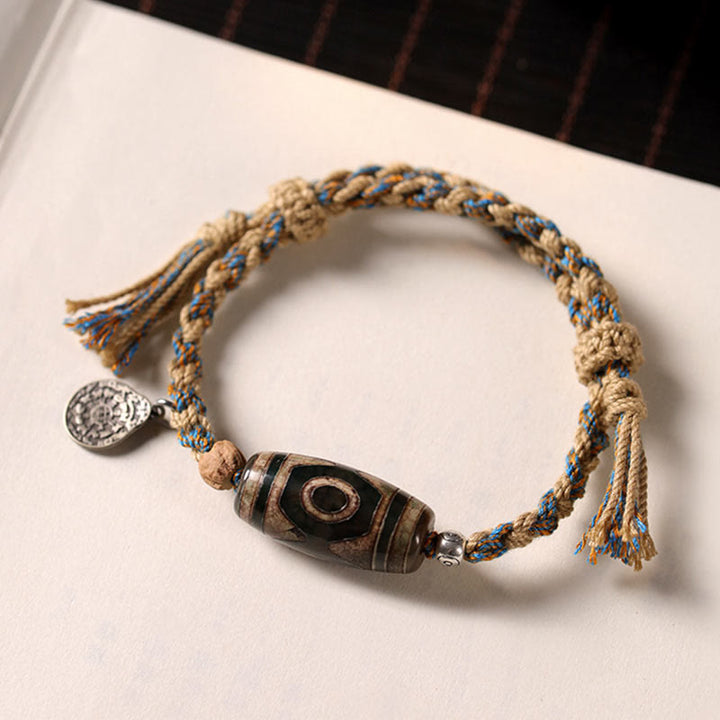 Bracciale intrecciato con Buddha Stones per la protezione della ricchezza