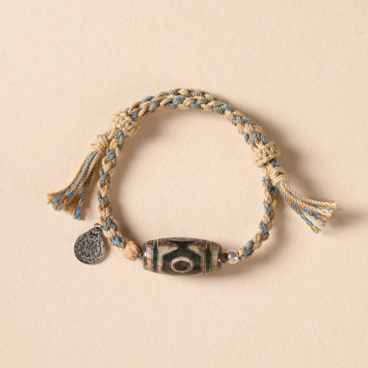 Bracciale intrecciato con Buddha Stones per la protezione della ricchezza