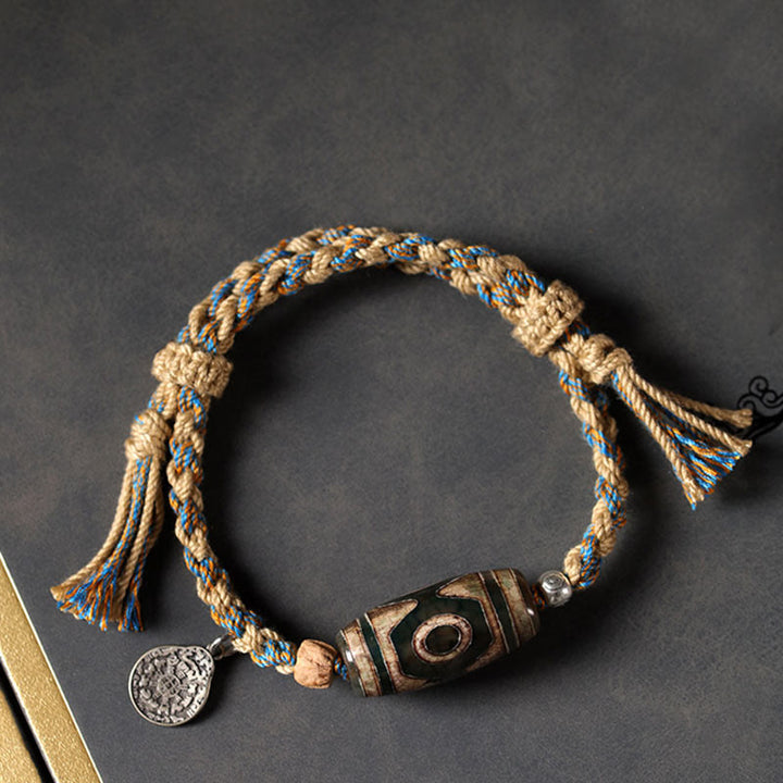 Bracciale intrecciato con Buddha Stones per la protezione della ricchezza