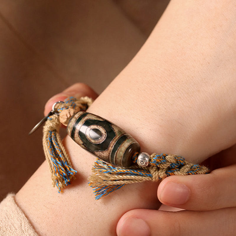 Bracciale intrecciato con Buddha Stones per la protezione della ricchezza