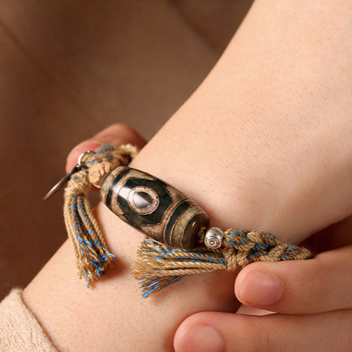 Bracciale intrecciato con Buddha Stones per la protezione della ricchezza