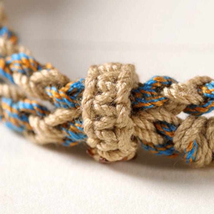 Bracciale intrecciato con Buddha Stones per la protezione della ricchezza