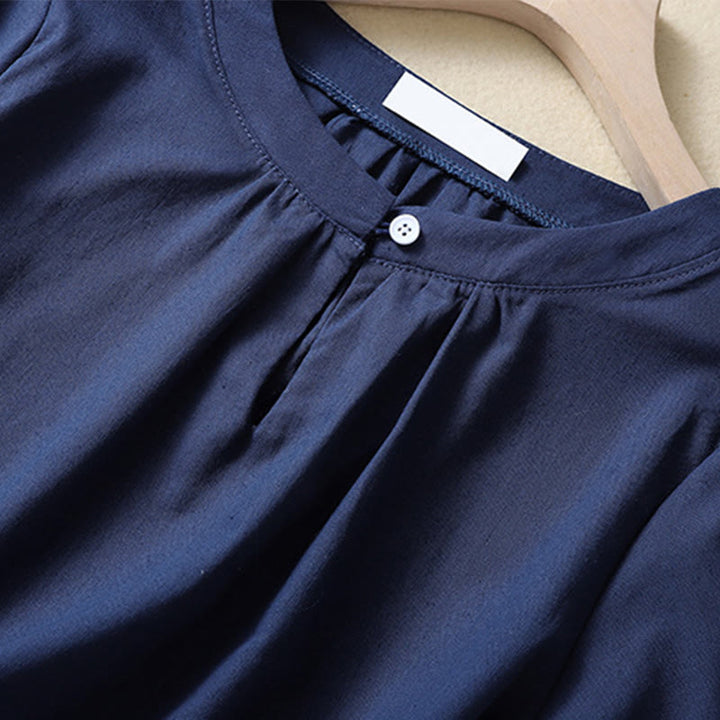 Camicia da donna casual a maniche corte con scollo rotondo e bottoni, con stampa Buddha Stones. - image 8