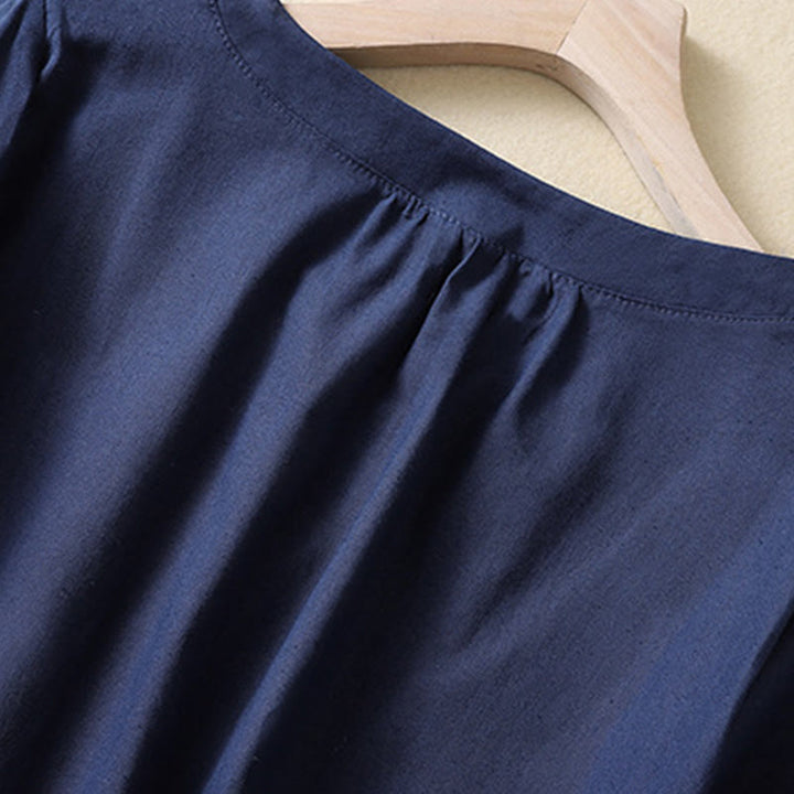 Camicia da donna casual a maniche corte con scollo rotondo e bottoni, con stampa Buddha Stones. - image 9