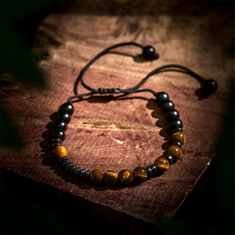 Set di 3 bracciali protettivi in pietra lavica con occhio di tigre Buddha Stones