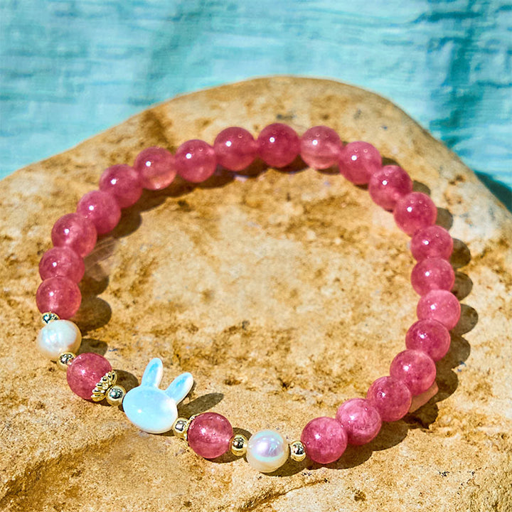 Braccialetto di guarigione Buddha Stones, quarzo fragola, perla, gatto e coniglio - image 3