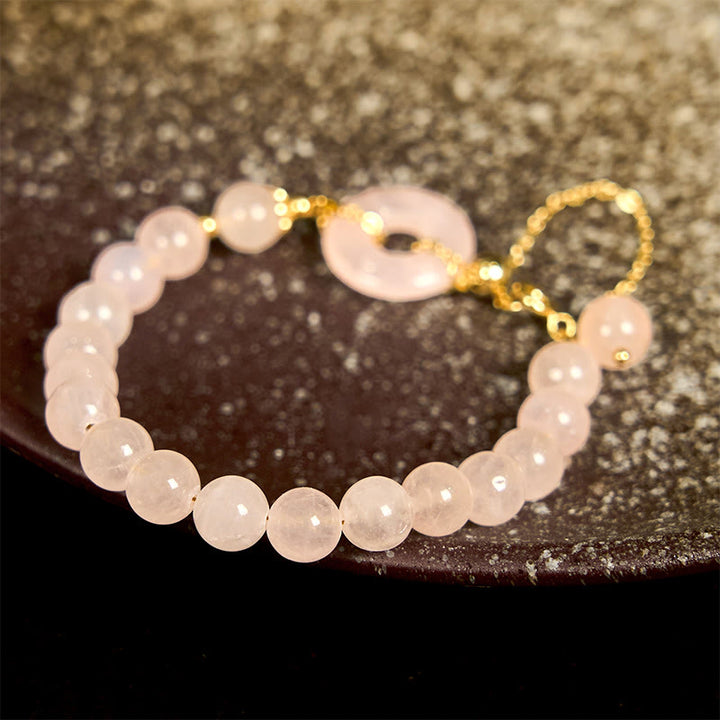 Braccialetto di autoaccettazione con fibbia della pace e perline di cristallo rosa naturale Buddha Stones