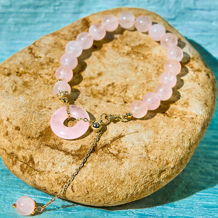 Braccialetto di autoaccettazione con fibbia della pace e perline di cristallo rosa naturale Buddha Stones