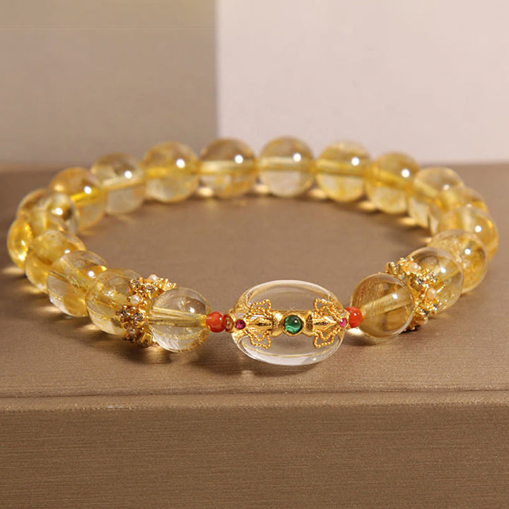 Bracciale di buon auspicio con perle di quarzo rutilato dorato naturale Buddha Stones