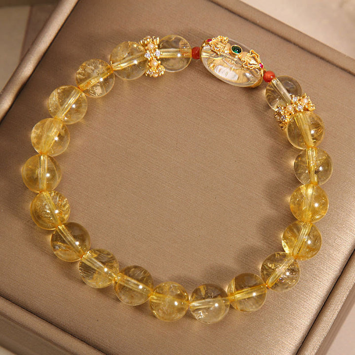 Bracciale di buon auspicio con perle di quarzo rutilato dorato naturale Buddha Stones