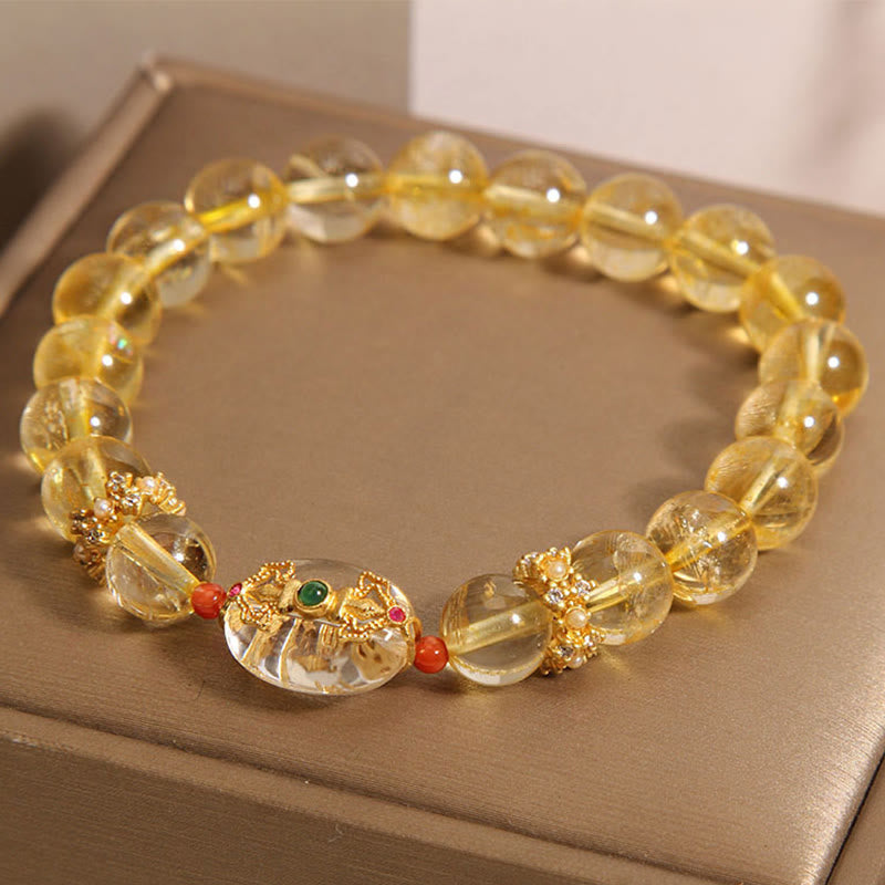 Bracciale di buon auspicio con perle di quarzo rutilato dorato naturale Buddha Stones