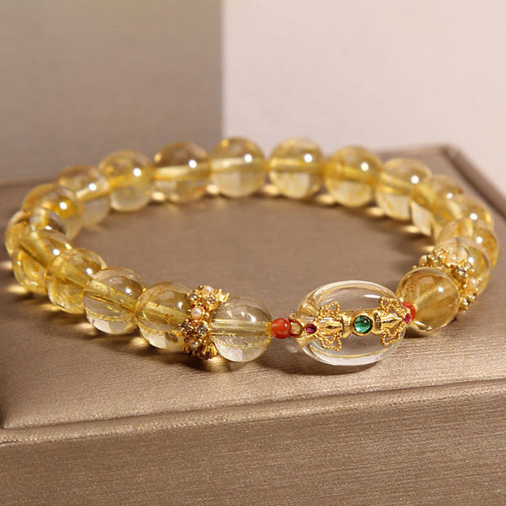 Bracciale di buon auspicio con perle di quarzo rutilato dorato naturale Buddha Stones