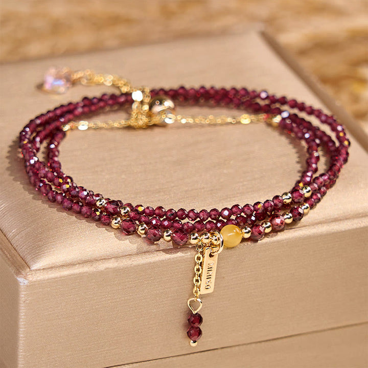 Braccialetto Buddha Stones piccolo granato naturale passione triplo giro