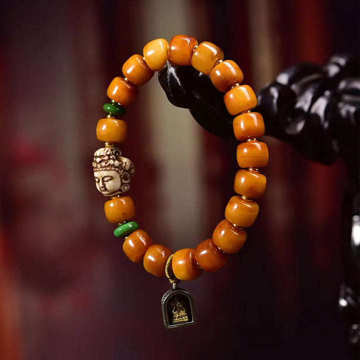 Braccialetto di protezione dalla fortuna con testa di Buddha, perline di osso di cammello tibetano naturale , Buddha Stones