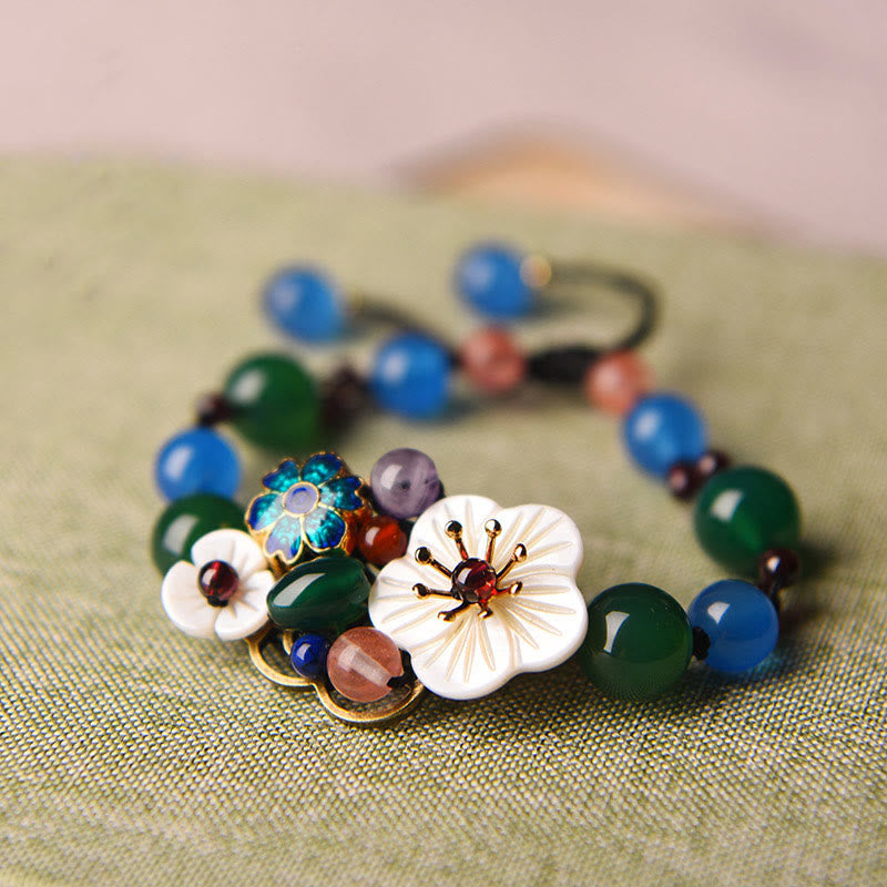 Braccialetto di supporto con fiori di agata e conchiglia Buddha Stones