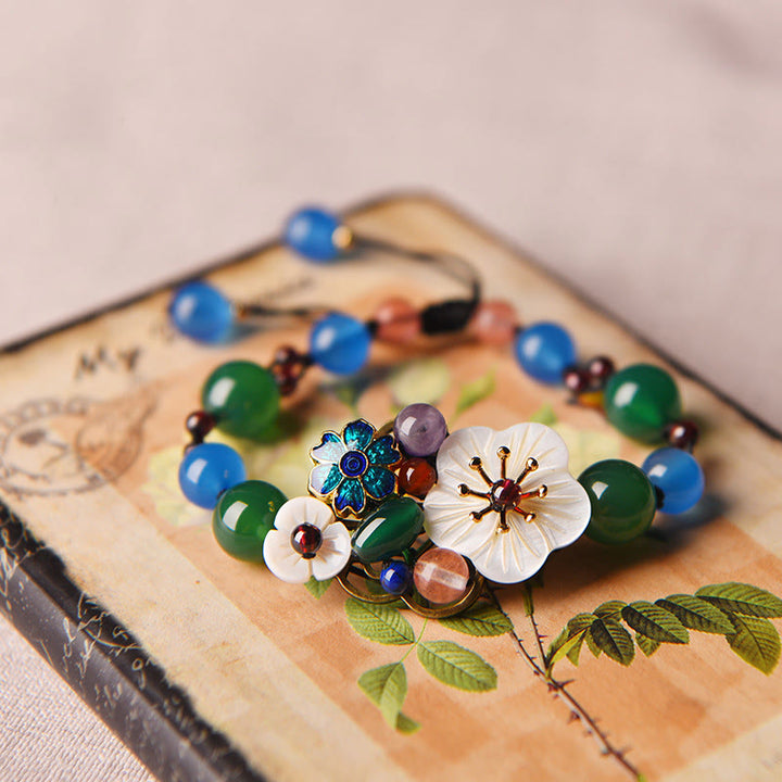 Braccialetto di supporto con fiori di agata e conchiglia Buddha Stones