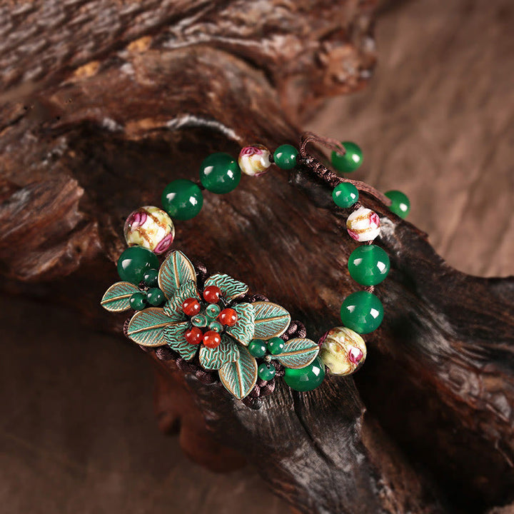 Bracciale con supporto a nodo intrecciato in perline di vetro agata verde Buddha Stones