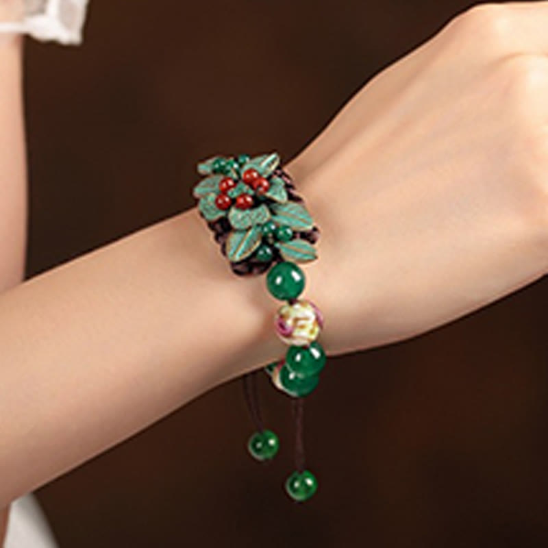 Bracciale con supporto a nodo intrecciato in perline di vetro agata verde Buddha Stones
