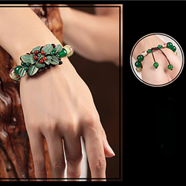 Bracciale con supporto a nodo intrecciato in perline di vetro agata verde Buddha Stones