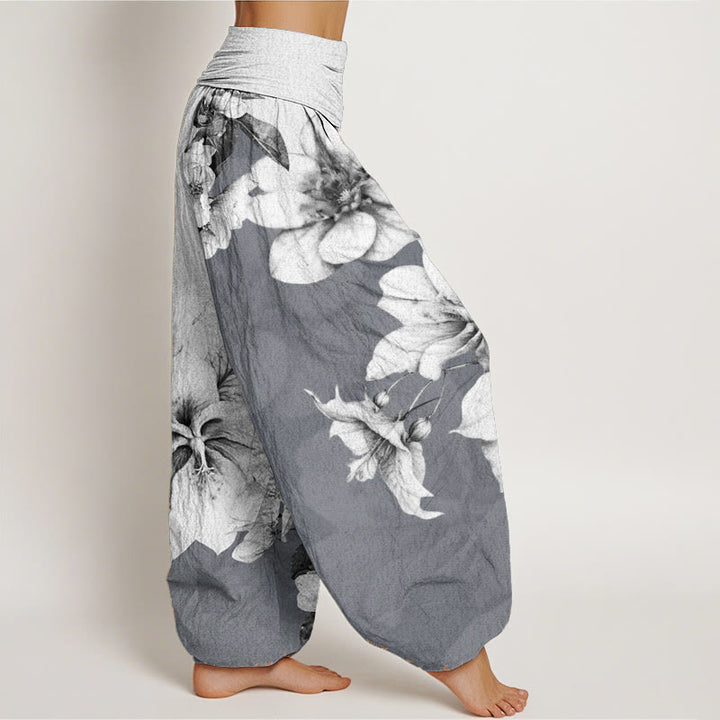 Pantaloni harem da donna con elastico in vita e motivo camelia in Buddha Stones