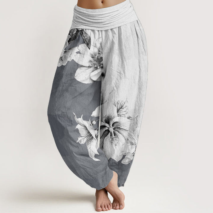 Pantaloni harem da donna con elastico in vita e motivo camelia in Buddha Stones