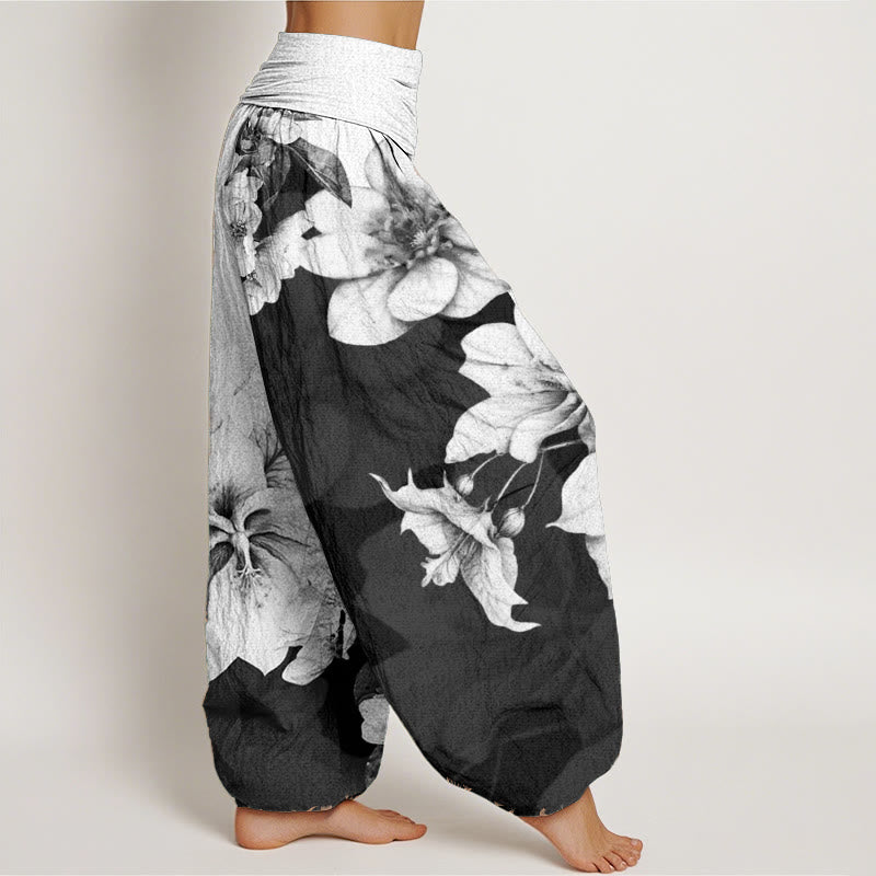 Pantaloni harem da donna con elastico in vita e motivo camelia in Buddha Stones