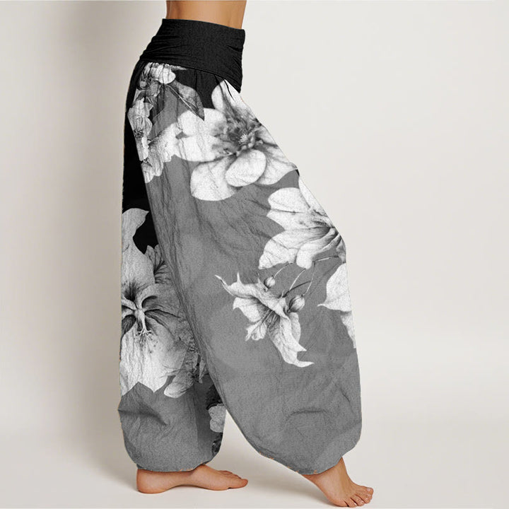 Pantaloni harem da donna con elastico in vita e motivo camelia in Buddha Stones