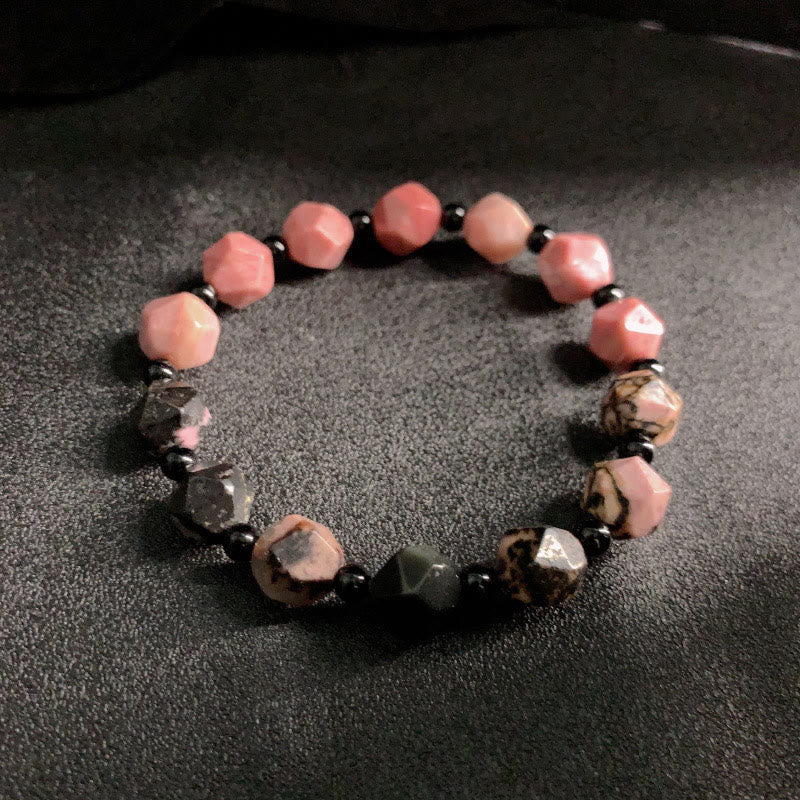 Braccialetto curativo con perline poligonali in pietra di rodonite naturale con linea nera e macchie rosse Buddha Stones