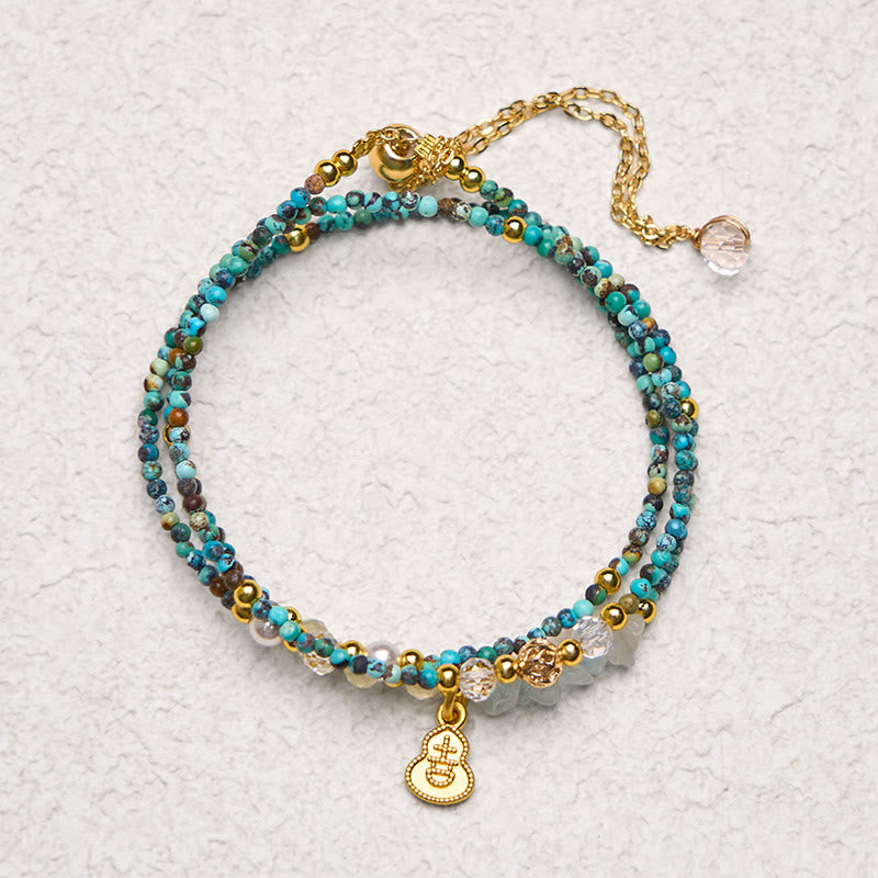 Braccialetto Buddha Stones con perline turchesi e triplo giro