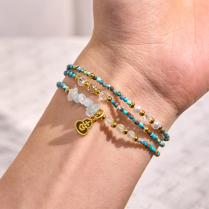 Braccialetto Buddha Stones con perline turchesi e triplo giro