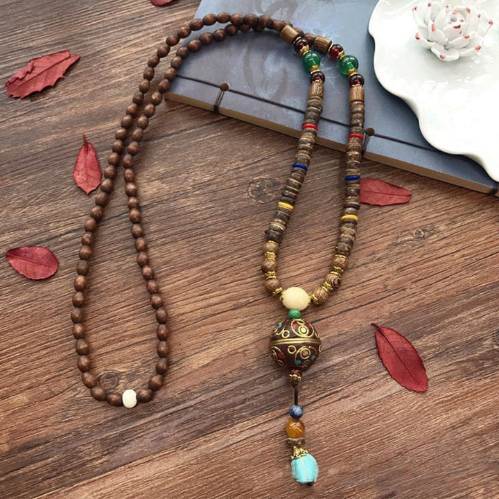 Collana con ciondolo in perline di rame, mantra luminoso, perline di rame, ciondolo in legno di Schima, fatto a mano in tibetano con Buddha Stones .