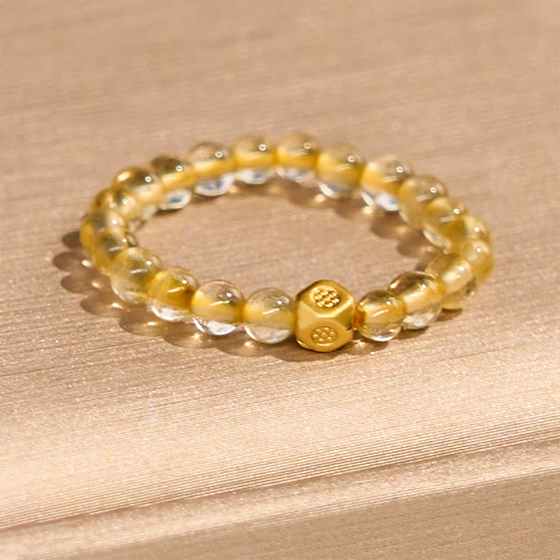 Anello elastico con perle di quarzo rutilato dorato da 3 mm Buddha Stones
