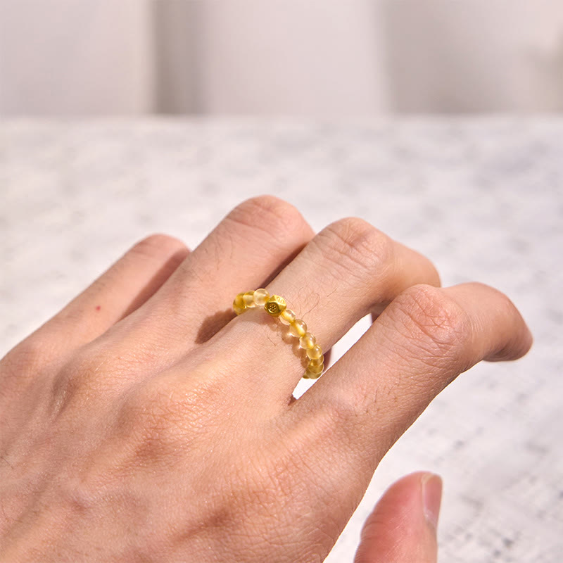 Anello elastico con perle di quarzo rutilato dorato da 3 mm Buddha Stones